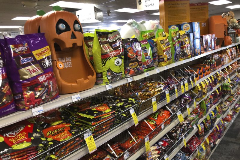 Americans load up on candy, trick-or-treat or not