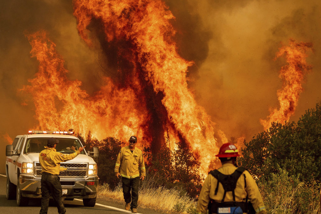 Nonpolitical news on California wildfire news,More than 100,000 flee Southern California wildfires under evacuation orders, unbiased source