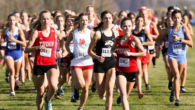 High school runner stops to help competitor at finish line of state ...