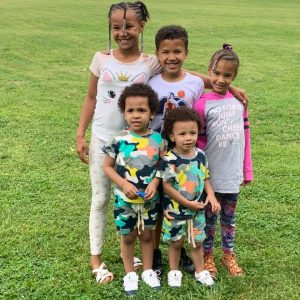 Single foster dad adopts five siblings so they can all stay together, photo of the siblings together, stay informed unbiased daily