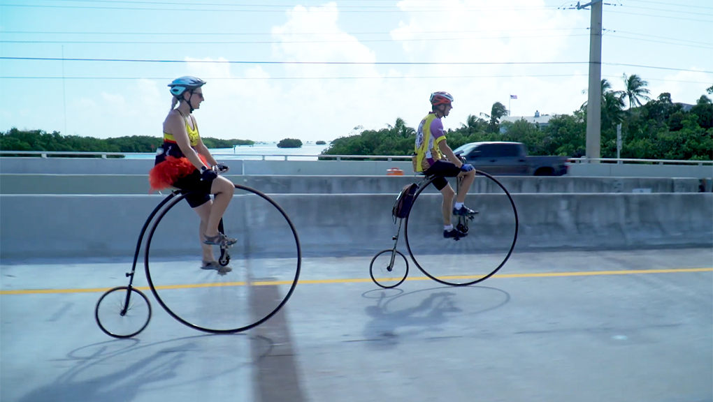 Father, Daughter Ride Antique High-Wheel Bikes From Michigan To Key West, stay informed about antique bike trips from unbiased News Without Politics