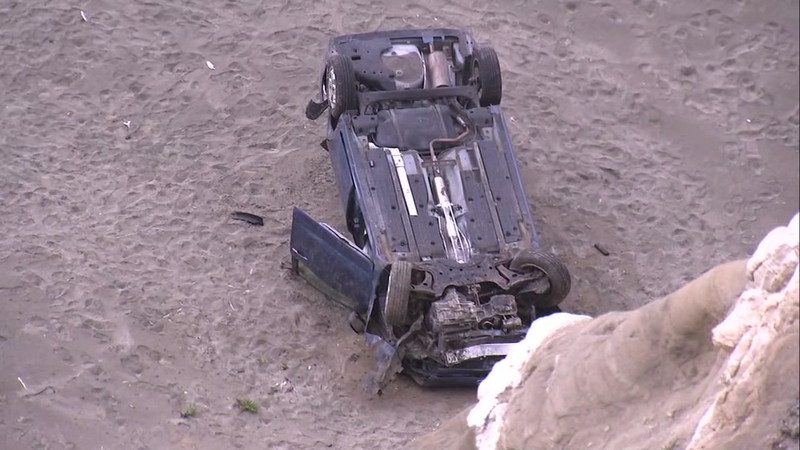 Car Plunges Off Cliff in San Francisco Beach