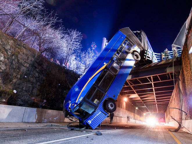 Bus dangles off overpass in NYC