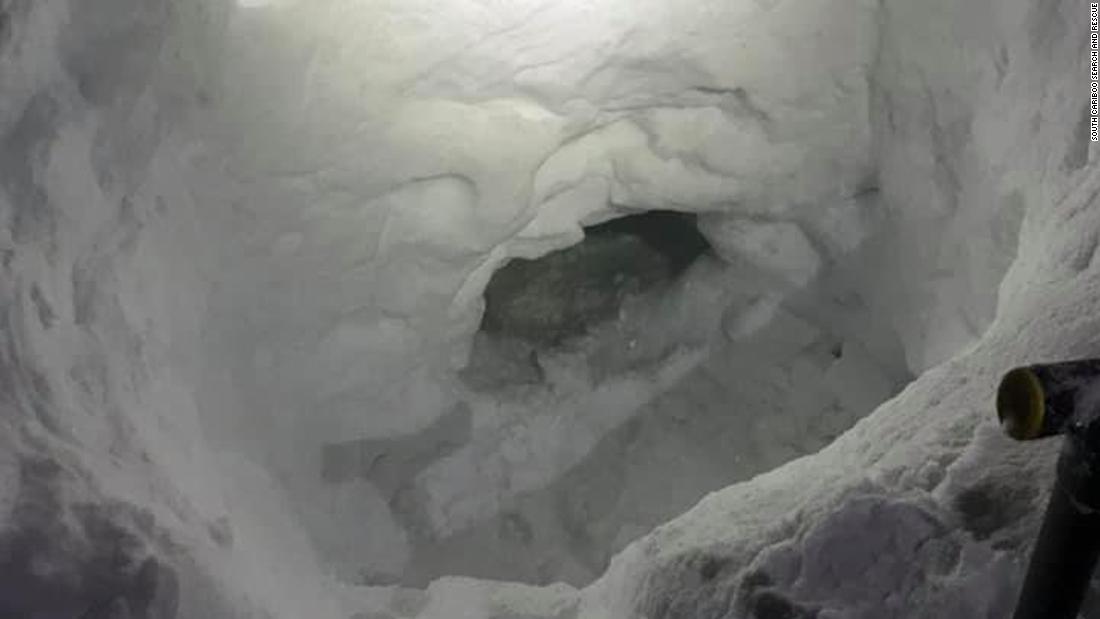 Missing snowmobiler built a snow cave to survive