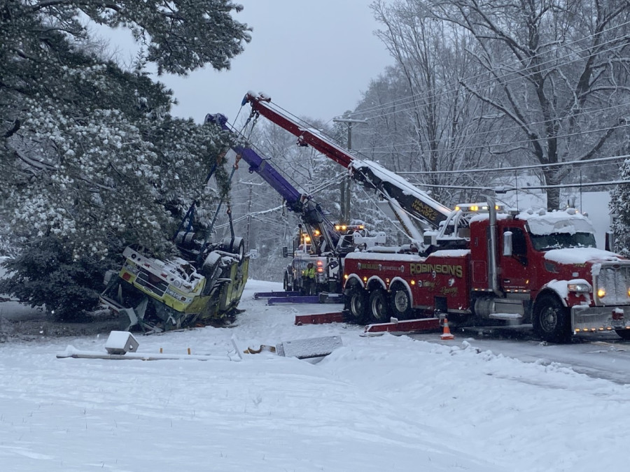 fire engine overturns in snow storm