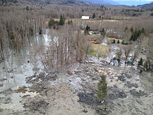 Tragic mudslide buries neighborhood-this day in history, follow News Without Politics, NWP, news without bias, mudslides