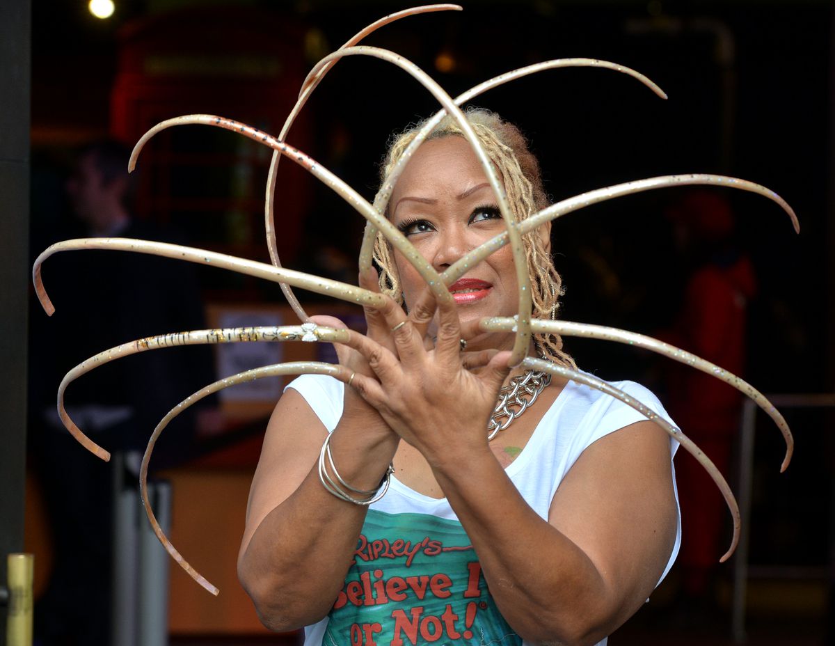 World's longest nails finally cut News Without Politics