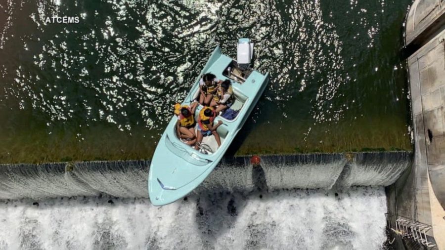 Boat Dangling Over Edge of Dam in Texas