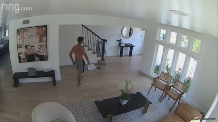 What happened when a naked intruder broke into Bel Air home?