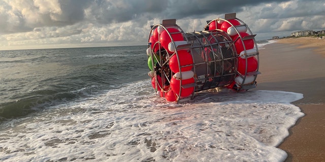 Man in bubble-like vessel rescued on beach!