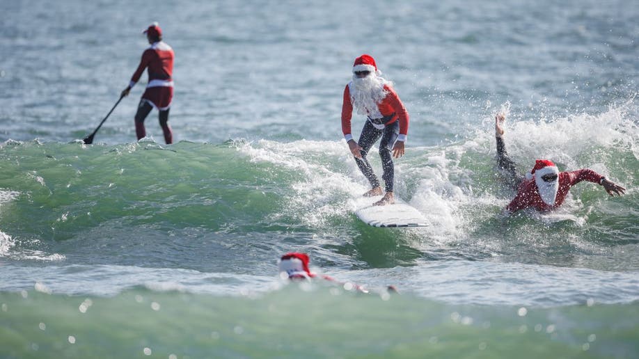Surfing Santas on Florida’s Space Coast with Special Guest!