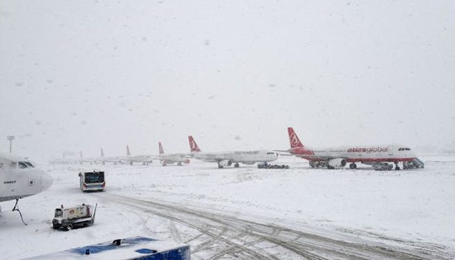 Snow shuts Europe’s busiest airport, roof collapses