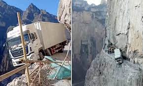 world news without bias, Container truck dangles over the edge of 330ft cliff , subscribe to News Without Politics, follow News Without Politics