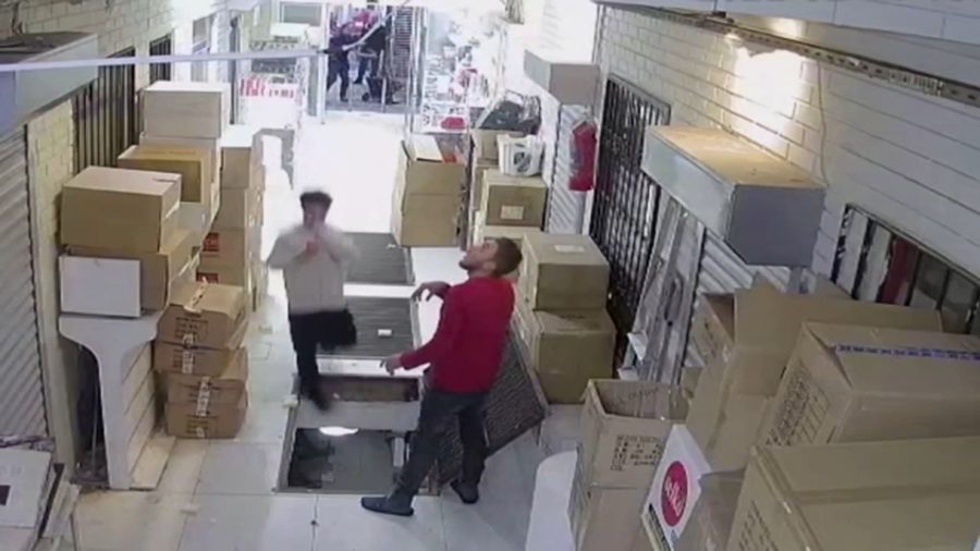 Distracted by phone-Saved by the box-Startling video