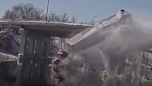 Dramatic video: Tractor-trailer plunges off bridge